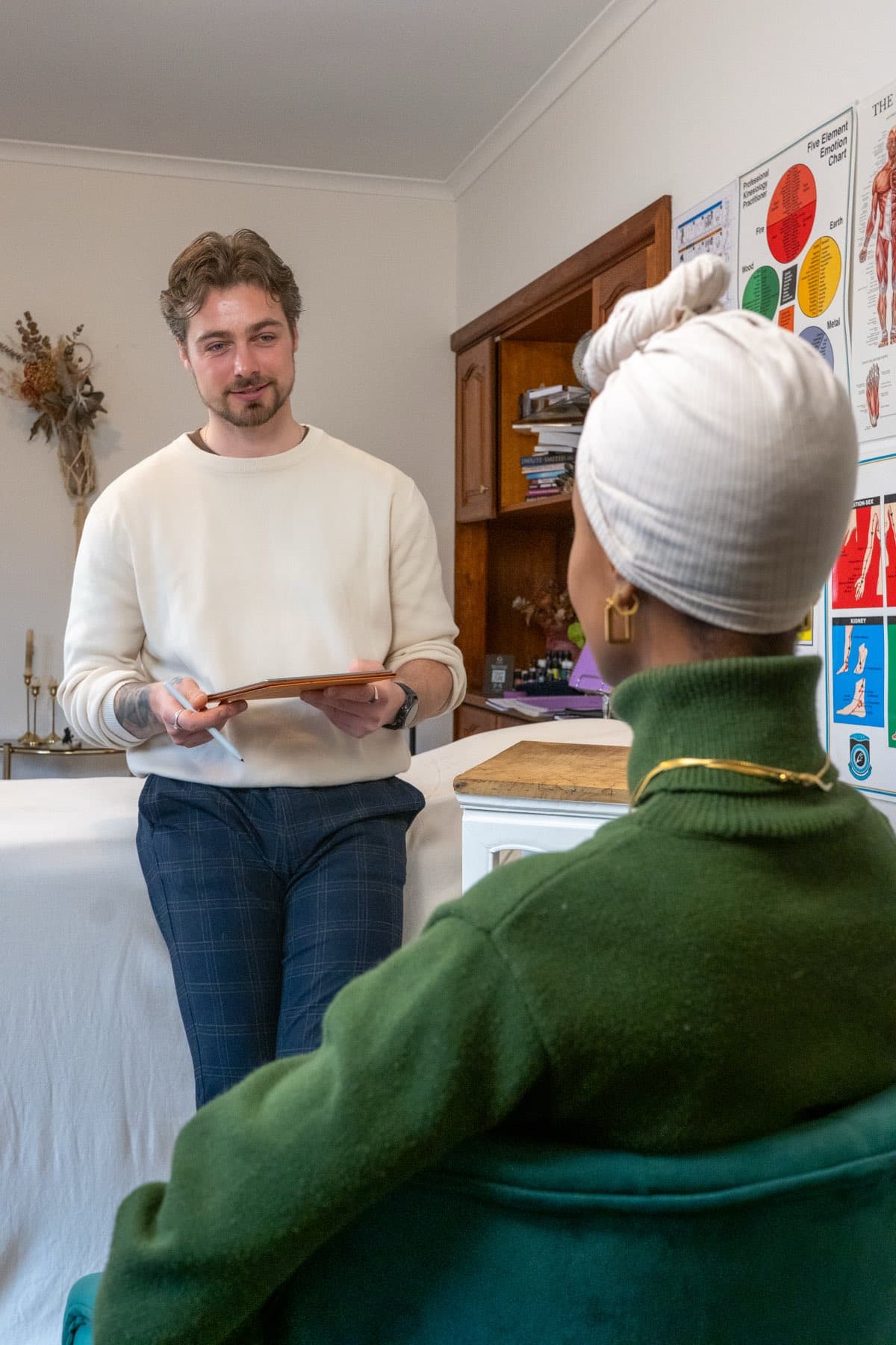 Kinesiologist Vildan Alihodzic talking with a client at the Intelligentle Healing clinic in Moorabbin